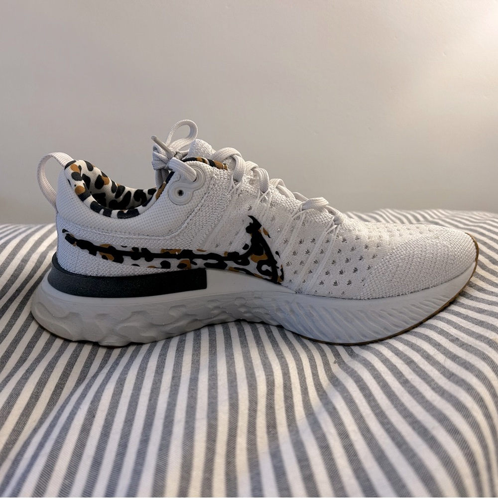Nike React Infinity Flyknit White Running Shoes with Leopard Accents